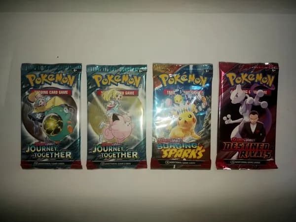 x4 booster packs: Destined Rivals, Journey together, Surging sparks