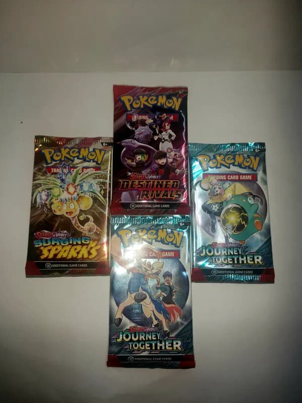 x4 booster packs: Destined Rivals, Journey together, Surging sparks