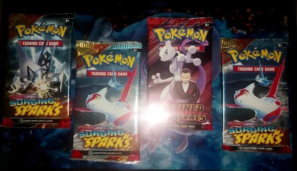x4 Booster packs: Destined rivals, Journey together, surging sparks